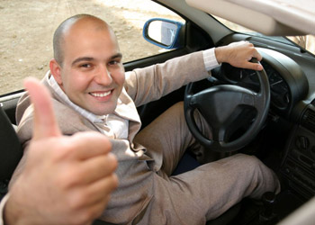 Smiling driver who got a great deal on his traffic school class through DTA